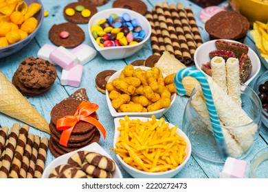 Table Of Salty And Sweet Snacks. Large Group Of Unhealthy Food