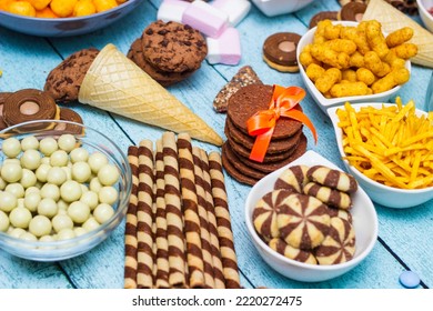 Table Of Salty And Sweet Snacks. Large Group Of Unhealthy Food