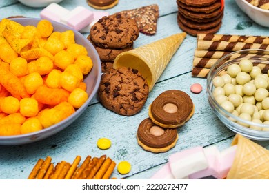 Table Of Salty And Sweet Snacks. Large Group Of Unhealthy Food