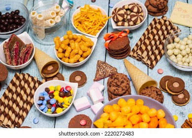 Table Of Salty And Sweet Snacks. Large Group Of Unhealthy Food