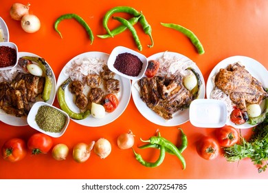 Table scene of assorted take out or delivery foods. Pizza, hamburgers, Doner, fried chicken and sides. Top down view on a table.