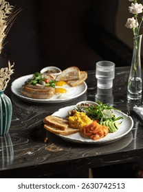 Table served with appetizing classic breakfast sets