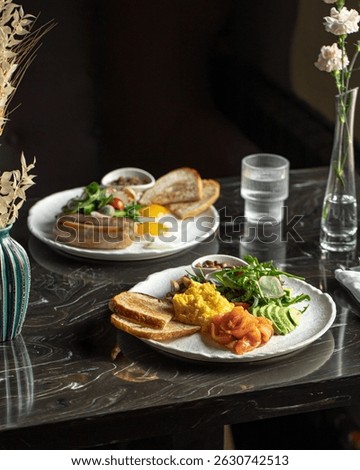 Table served with appetizing classic breakfast sets