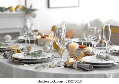 Table Served For Christmas Dinner In Living Room, Close Up View