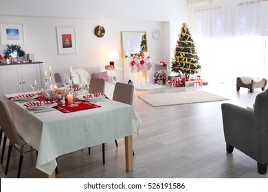 Table Served For Christmas Dinner In Living Room