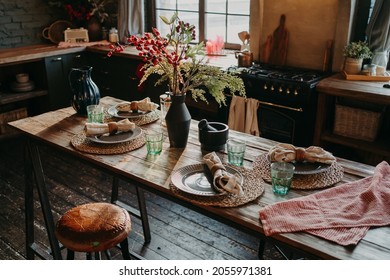 Table Served For Dinner. Cozy Kitchen Interior. Cultery And Napkins On Table For Guests. Family Breakfast. Dining Time. No People.