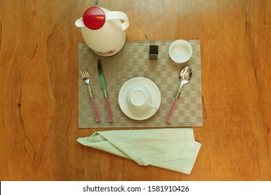Table set with crockery and kitchen elements