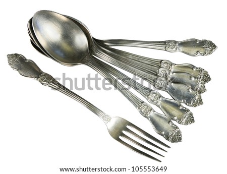 Table set from cupronickel on a white background