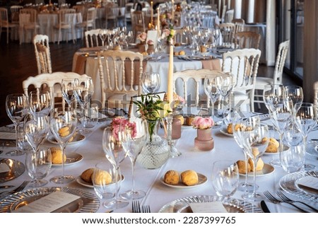 table set up and decorated for a wedding dinner