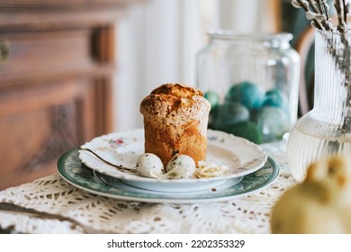 Table Set For Easter On Veranda On Sunny Spring Day Decorated With Flowers And Easter Decor, Eggs, Cake And Willow Branches, Easter Family Celebration, Grain And Noisy Effect