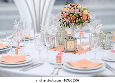 Table set for an event party or wedding reception, spring theme