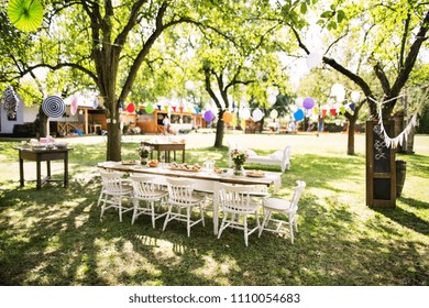 Table Set For A Garden Party Or Celebration Outside.