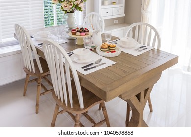 Table Set On Wood Dinning Table At Home, Modern Dinning Room