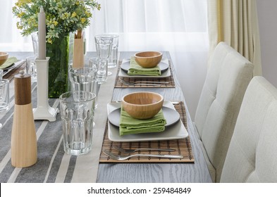 Table Set On Wooden Dinning Table At Home