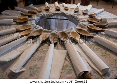 table set for the Toc typical dish of the Bellagio area, Como Lake, Italy