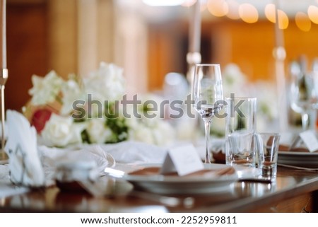 Table set for wedding or another catered event dinner ceremony. Wedding, birthday, party, event concept.