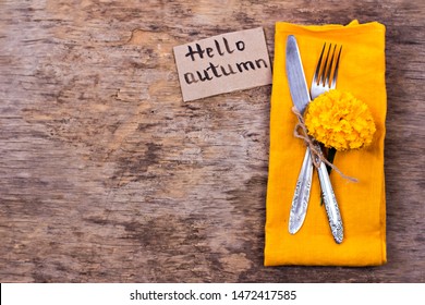  Table Setting With Autumn Decor.  Fork, Knife, Napkin, Cutlery. Holiday Decorations.Thanksgiving Dinner.  Autumn Mood, Halloween, Thanksgiving, Holiday Concept.Top View. Selective Focus. 