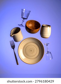 A table setting with ceramic dishes and glassware