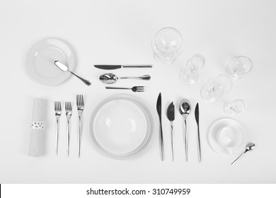 Table setting, close up, on white background - Powered by Shutterstock