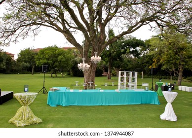 Table Setting Decoration At A Gala Dinner Corporate Formal Event Banquet Outdoor Chandelier Tree Blue Green Fresh