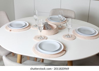 Table Setting With Dishes And Tableware In Stylish Modern Interior. No People. Idea For Home Design. Dining Room Has Table With Place Settings. Vertical Shot.