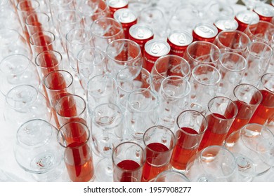 Table Setting For A Holiday Or Party. Glasses For Spirits, Champagne And Juice. Whiskey-Cola Drink. Close-up. Russia, Saint Petersburg, 04.04.2021.