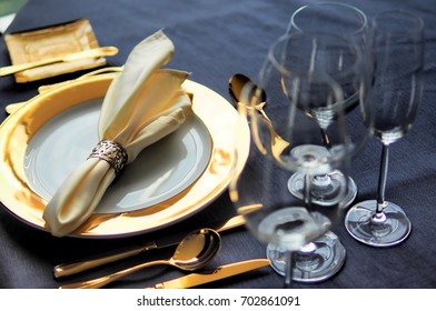 Table Setting Luxury Set Dish,knife,sppon And Fork,wineglass On Blue Tablecloth