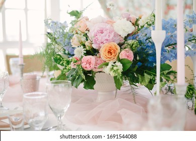 Table Setting At A Luxury Wedding And Beautiful Flowers On The Table.
