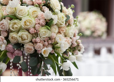 Table Setting At A Luxury Wedding Reception. Beautiful Flowers On The Table.