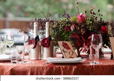 Table Setting At A Luxury Wedding Reception. Beautiful Flowers On The Table.