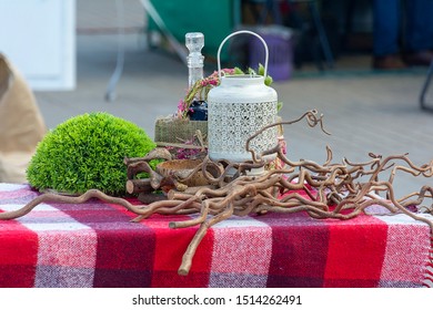 table setting in a rustic style. Household items and various decorative ornaments. Lifestyle, interior and decor.