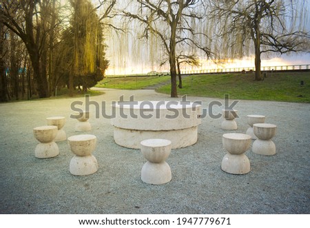 Table of Silence. Round table made of stone in beautiful park.
