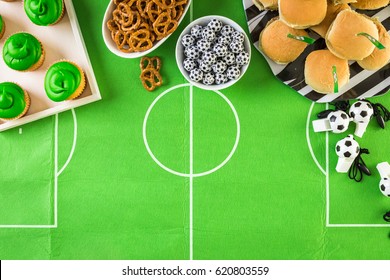 Table With Snacks For Football Party.