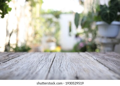 Table Surface View With Blur Garden Background
