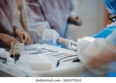 table with surgical instruments, the work of an assistant in a surgical operation