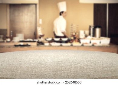 Table Of Tablecloth And Cook 