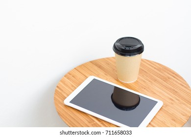 table with tablet and coffee