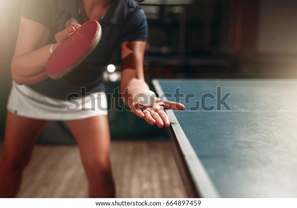 Table tennis,\
female player with racket and\
ball