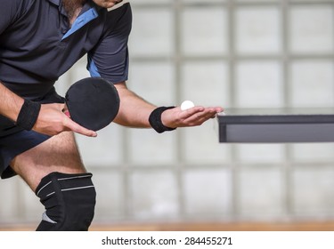 Table Tennis Player Serving