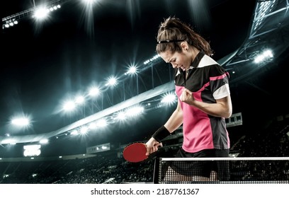 Table Tennis Player. Young handsome woman celebrating flawless victory.