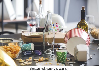 Table With Terrible Mess In Office After New Year Party