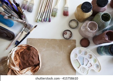 The table with tools for creativity. Art background. No people.
 - Powered by Shutterstock