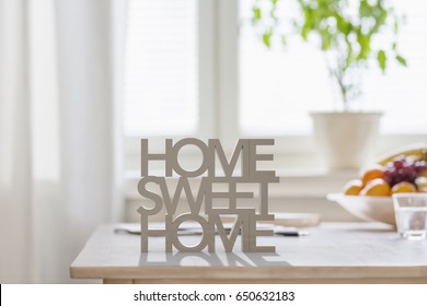 Table Top With 3D Letters Making The Words Home Sweet Home