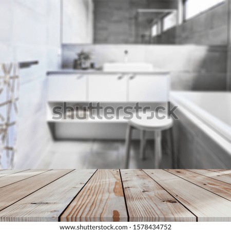 Table Top And Blur Bathroom Of The Background
