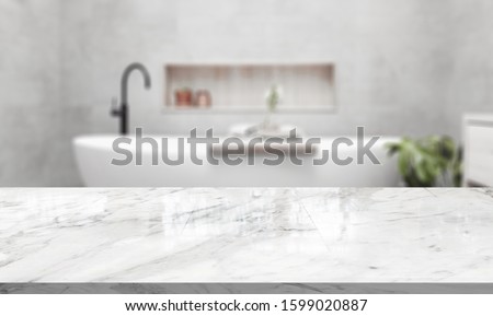 Table Top And Blur Bathroom Of The Background