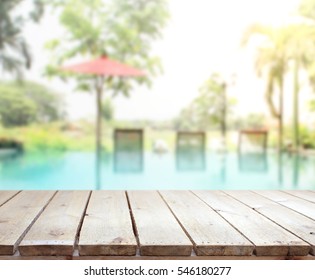 Table Top And Blur Swimming Pool Of The Background