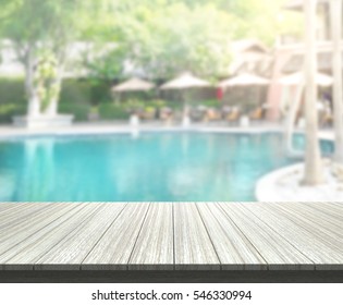 Table Top And Blur Swimming Pool Of The Background