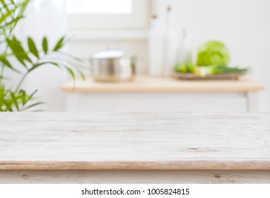 Table Top And Blurred Kitchen Room As Background