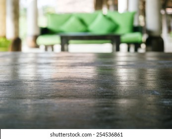 Table Top With Blurred Living Room Sofa Background