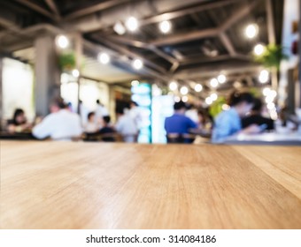 Table Top Counter In Coffee Shop Cafe Blurred People Background 